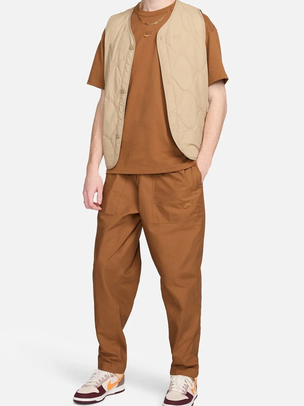 Nike loose fit tapered club pants size S